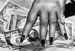 "Fat Hand and Dollars, Monte Carlo 1985" by Helmut Newton