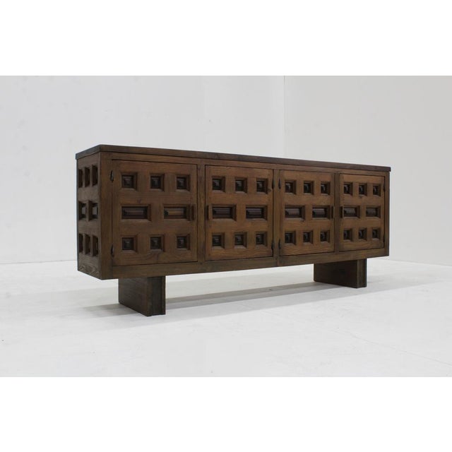 Vintage Brutalist Spanish carved sideboard credenza Brutalist wooden Spanish sideboard from the 1960s. Beautiful carved...