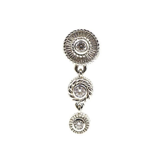 Highly stylized drop earrings featuring sterling silver circles with CZ centers. The one on the ear is the largest. The...