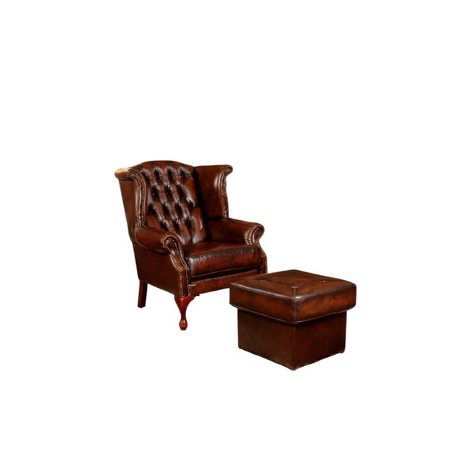 Elegant hand-tufted leather wingback chair with matching ottoman, crafted for timeless style and everyday comfort....