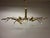 This - probably French - chandelier is very similar to the Ruban Plié by Jacco Maris,it is a charming, contemporary...