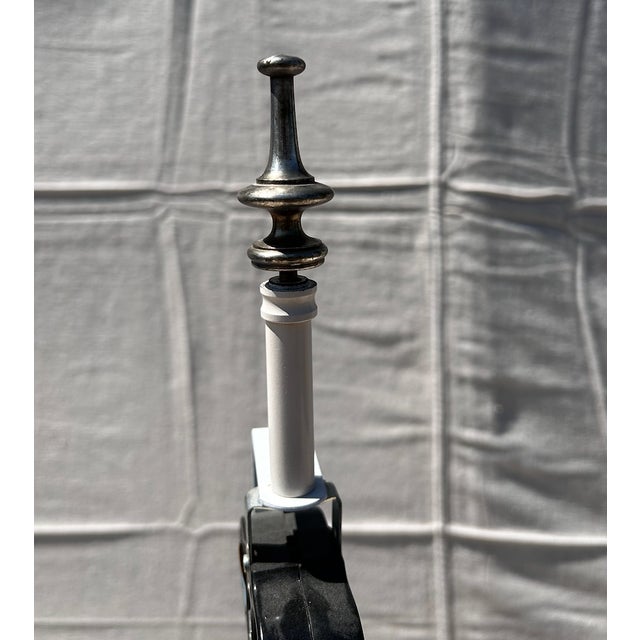 A pair of antique English silver plated candlesticks converted into lamp bases.