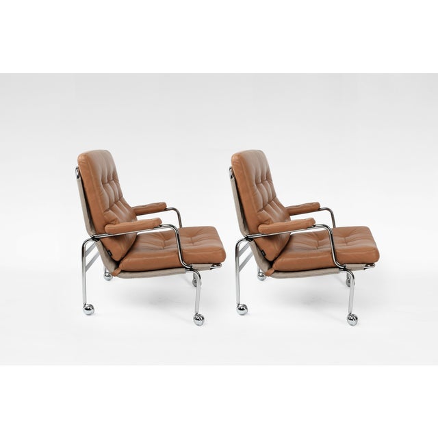 A beautiful example of Swedish modernism, this vintage Karin Lounge Chair by Bruno Mathsson for DUX (late 1960s) embodies...