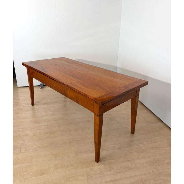 Rectangular biedermeier dining table from france, circa 1820, extendable on both sides. * beautiful solid cherry wood,...