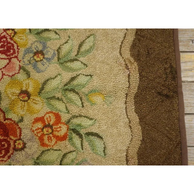 A Ivory Background Color With Beautiful Roses Centerpiece in Floral Pattern Antique American Hooked Rug For Sale - Image 9 of 12