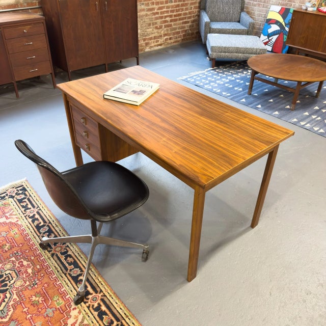 This desk has some very cool hidden storage. The top sides both to the left and right, revealing two separate hidden...