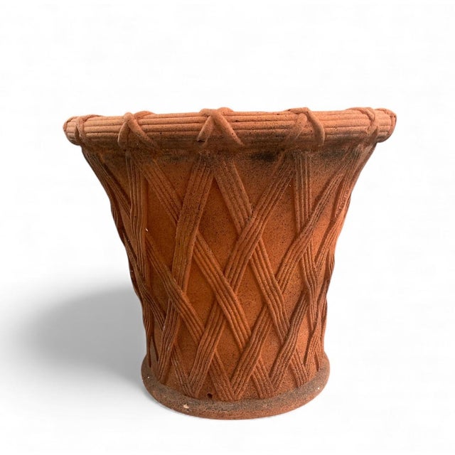 Elevate your garden or interior with this English terracotta planter, featuring a finely detailed relief basketweave...
