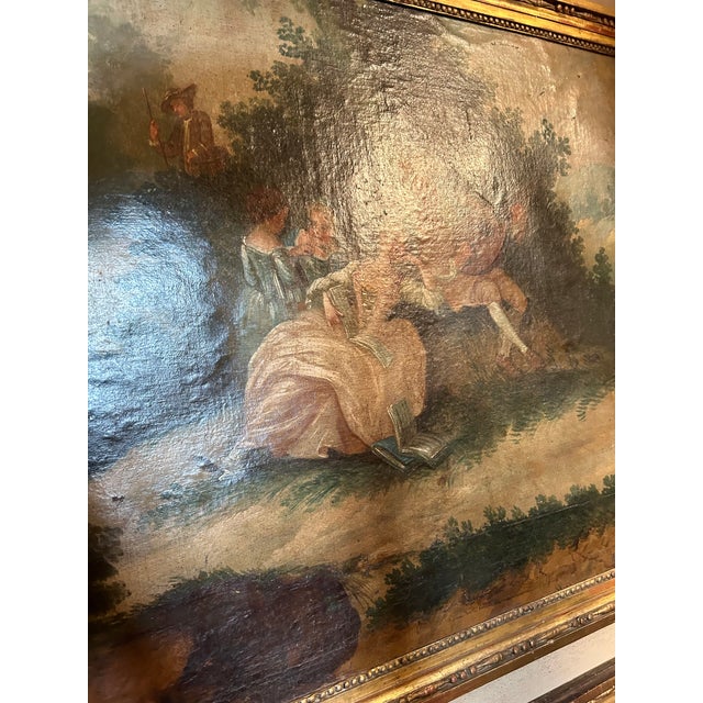 Louis XIV French trumeau. Beautifully painted scene. Gold guiltwood frame.