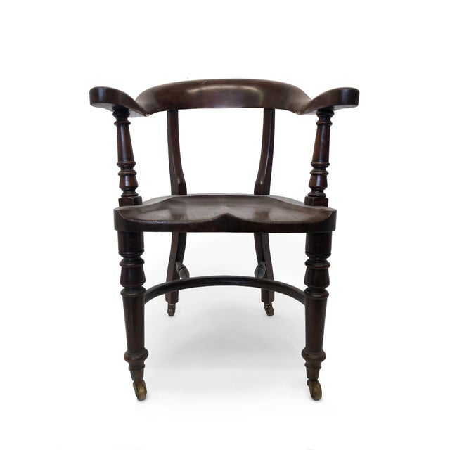 Early 20th Century Wooden Captain's Chair | Chairish