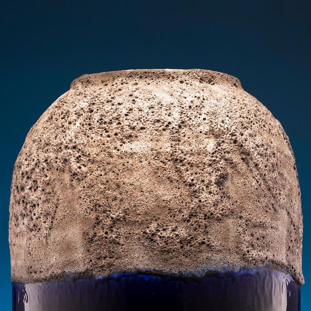 This vase is an extremely rare and impressive object. The upper coating of this stunning floor vase from the 1960s/70s...