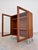 This 1960s display cabinet is an exclusive piece by designer h. W. Klein, crafted by the danish manufacturer bramin. A...