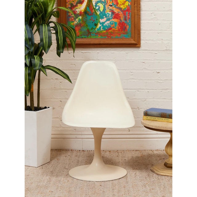 With its modern low profile, and stylish frame, this dining chair is sure to be an eye-catching piece for any style of...