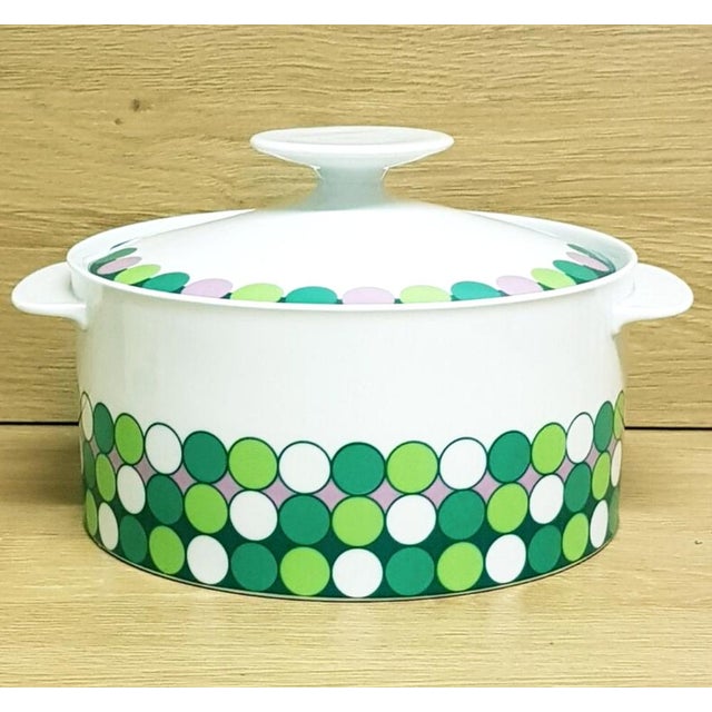 Made by Thomas, Germany, a porcelain soup tureen has a vibrant 1970's pop design with green and pink polka dots. Its round...