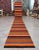 Woven in the 1970s in the Eskişehir region of Central Anatolia, this extra-long Turkish kilim runner brings a bold stripe...