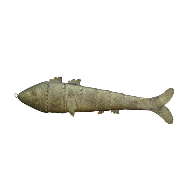 Mid to late 20th century wall hanging brass fish - 8 inches long with a segmented, articulated body, etched with scales...