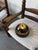 Vintage 1960s ceramic wall sconce in the style of George Pelletier's designs. Round shape, with the socket housing a...