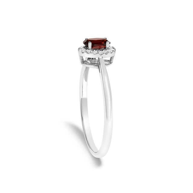 Early 21st Century 10K White Gold 5X3MM Oval Red Garnet and Diamond Accent Halo Ring (I-J Color, I1-I2 Clarity) - Ring Size 6.5 For Sale - Image 5 of 7