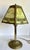 This antique Edward Miller table lamp dates to 1850-1920s, and features beautifully marbled green and custard slag glass...