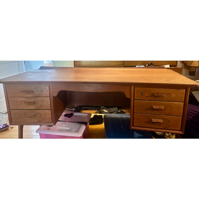 This is a beautiful and sought after scandinavian modern executive desk in teak designed by Svend Madsen and manufactured...