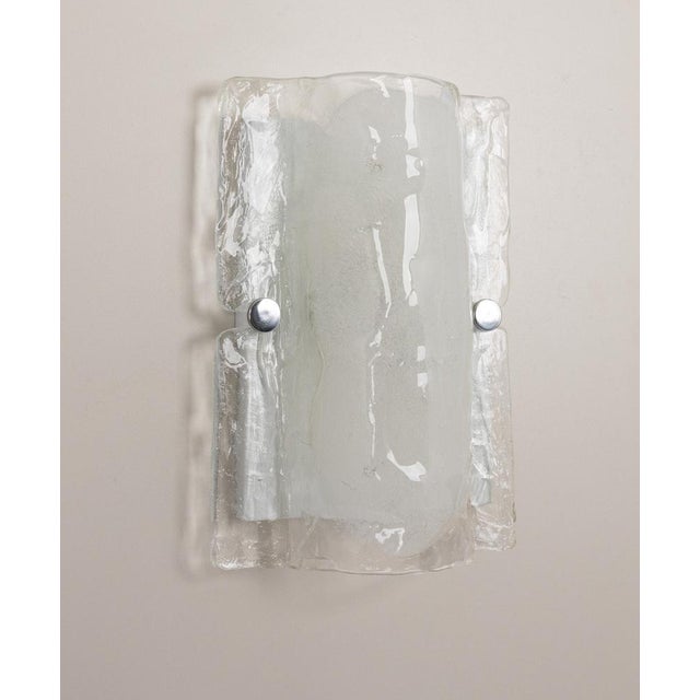 Wonderful pair of midcentury wall sconces with one large murano glass piece in each lamp, made by kalmar, austria,...