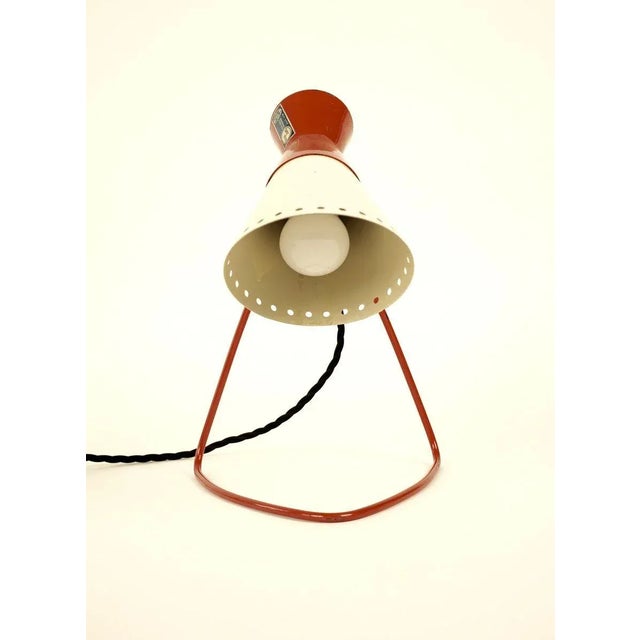 This midcentury table lamp designed by Josef Hurka in Czechoslovakia for the company Napako in 1958. It is contracted out...