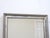 This gray toned silverleaf mirror measures 29.5"H x 20.25"W.