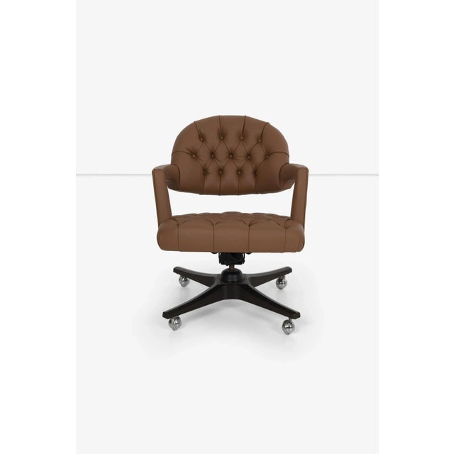 Edward Wormley for Dunbar tufted cantilevered desk chair in spinneybeck saddle leather, reupholstered. Also features solid...