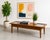 Mid Century Modern Walnut and Smoked Glass Coffee Table by Lane Furniture Co. The table features two smoked glass inserts...