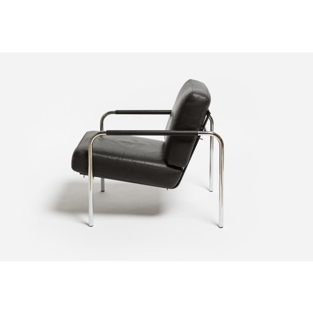 The armchair is an early design by Mucchi from the 1930s, which was revised for mass production by Zanotta in 1983. The...