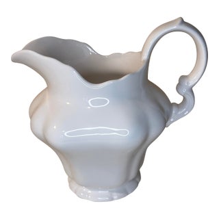 A Beautifully Sculpted, Glossy White Ceramic Pitcher. For Sale