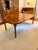 Expandable Burl Walnut Dining Table A great-looking table with mid century character. The rounded ends on this rectangular...