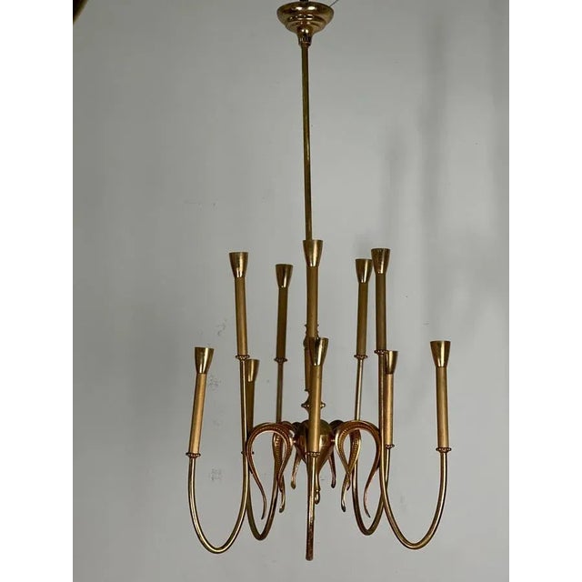 Chandelier produced by Interlampadari F.I.L.C. (Fabbrica Italiana Lampadari Classici), a Milanese company founded in 1950...