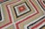A high decorative one of a kind room size Persian Reproduction rug derived from an American Navajo rug with an all-over...