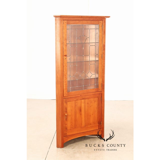 High Quality American Made Cherry Corner Cabinet With Leaded Glass Door Opening to Adjustable Glass Shelves and Interior...