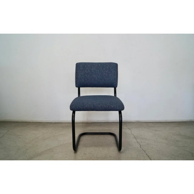 Vintage Midcentury Modern Cesca chair for sale. Has the original black cantilever metal frame. It's been professionally...