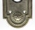 Traditional style bronze privacy door back plate with a nickel finish and a turn latch. The original mounting screws are...