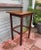 This is a charming vintage side table, perfect for adding a touch of classic style to your living space. Crafted from...