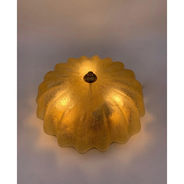Elegant single vintage ceiling light. Dark ocher colour. Attributed to Seguso Transparent ocher glass with glass grit...