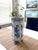 This Chinese porcelain octagon vase features traditional figures on three sides alternating with prunus branches & birds...