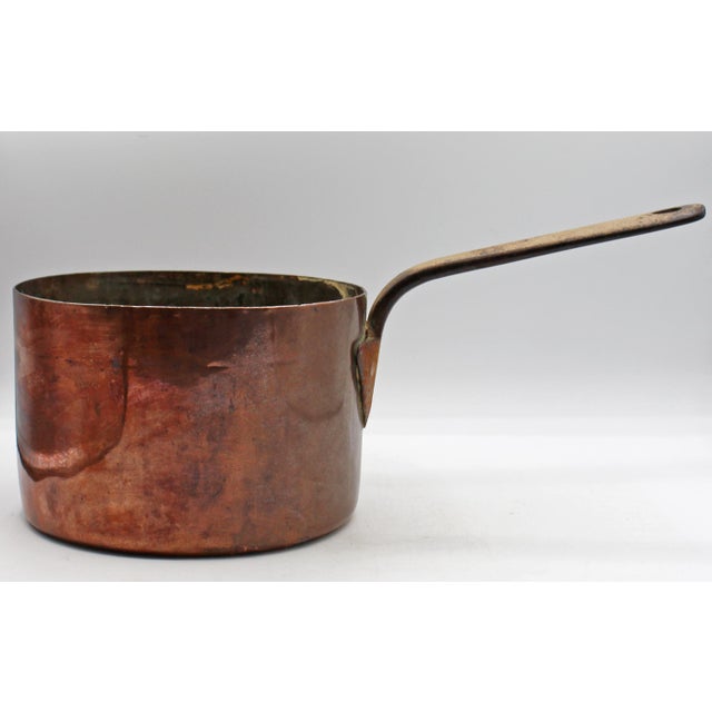 Later 19th century French copper sauce pan. Stamped "22". Great iron handle with copper rivets, loop tip for hanging....