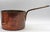 Later 19th century French copper sauce pan. Stamped "22". Great iron handle with copper rivets, loop tip for hanging....