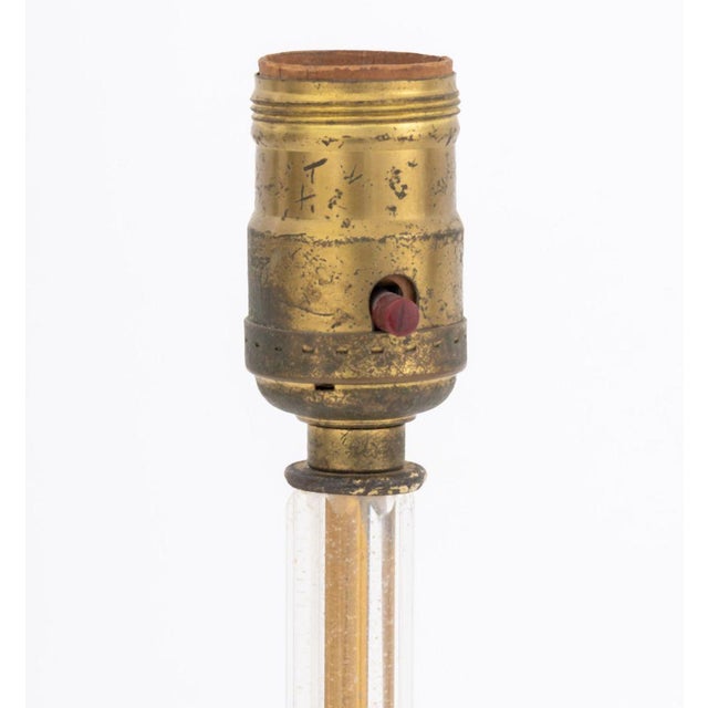 Pair of Art Deco Cut Crystal and Brass Lamps, with brass flower mounts and mirrored circular base on four bun feet. 14.75"...