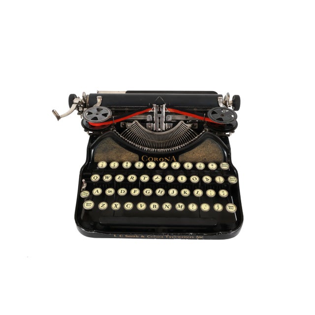 The Corona Four hit the market in 1924 as Corona's first 4-row keyboard portable that fit into a case without folding the...