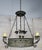 19th century Spanish wrought iron circular chandelier. Six lights in three pairs of two with drip wax candle covers held...