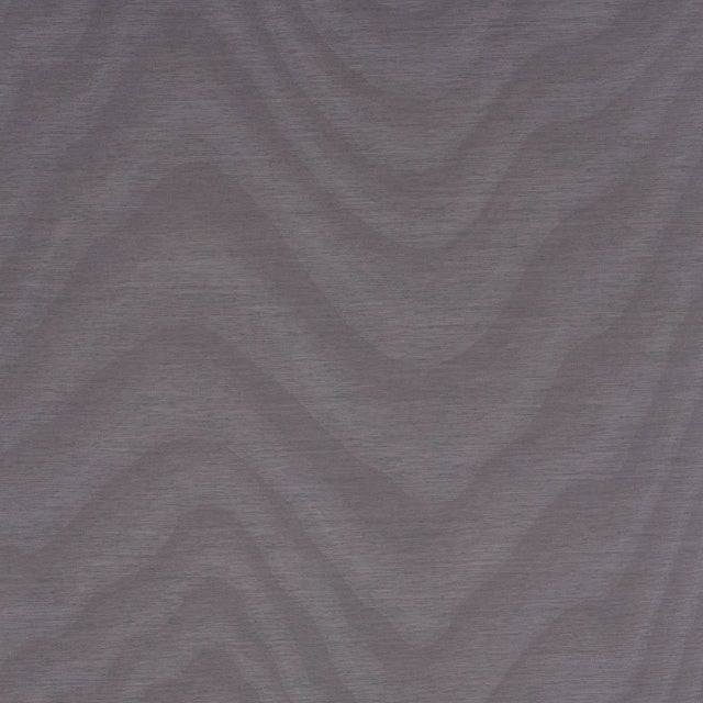 This subtle, showstopping tone-on-tone wallcovering is woven on a jacquard loom and then piece dyed to give it a chic,...