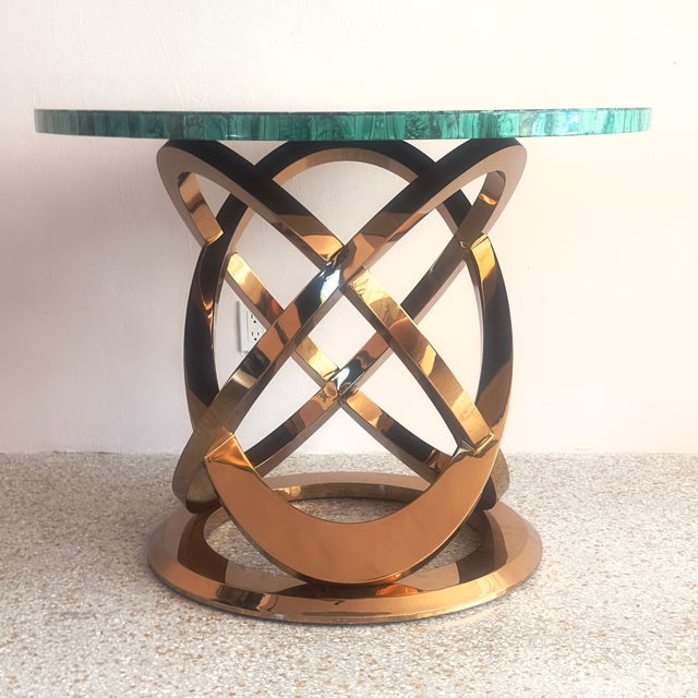 This Luxury Green Malachite Semiprecious Stone Table features a hand-polished, mosaic-patterned gemstone top paired with a...