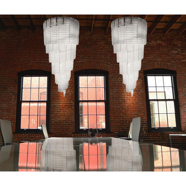 Fantastic vintage Murano chandelier made by 83 Murano frosted glass plates in a nickel metal frame. The shape of this...