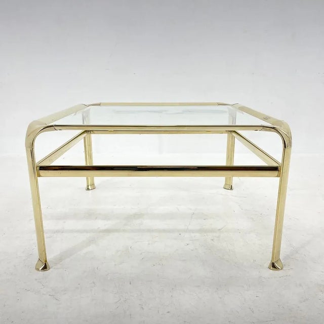 Italian design all-brass & glass coffee table by Mauro Lipparini, labeled. The table shows some signs of time (see photo)....