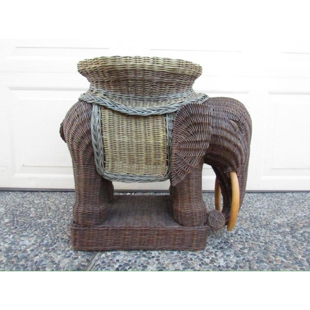 Vintage whicker elephant stool or side table, c.1970’s A fun stool, that is solid and comfortable to sit on, or a side...
