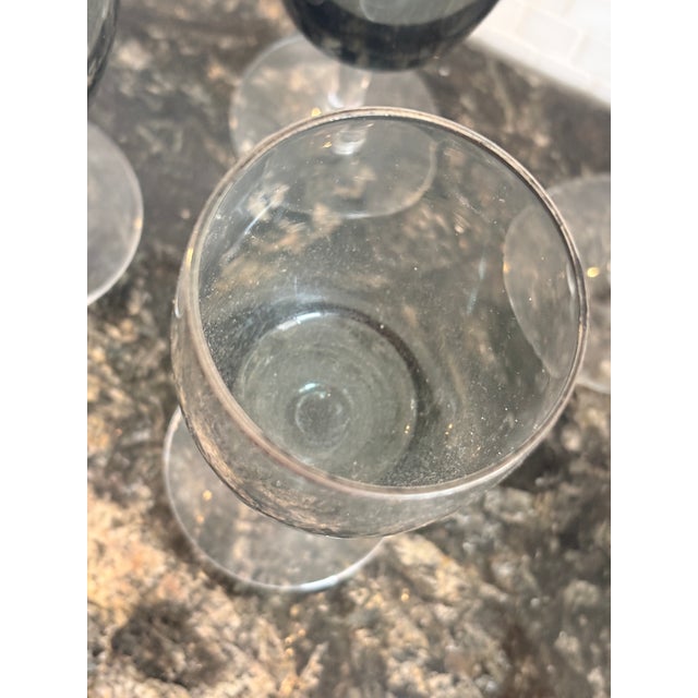 Once called CORDIAL now serve as SHOT glasses for whichever liquor you imbibe! Sexy smoked glass set w silver rim!